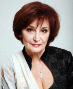 Олга Дреге (Olga Dreģe).